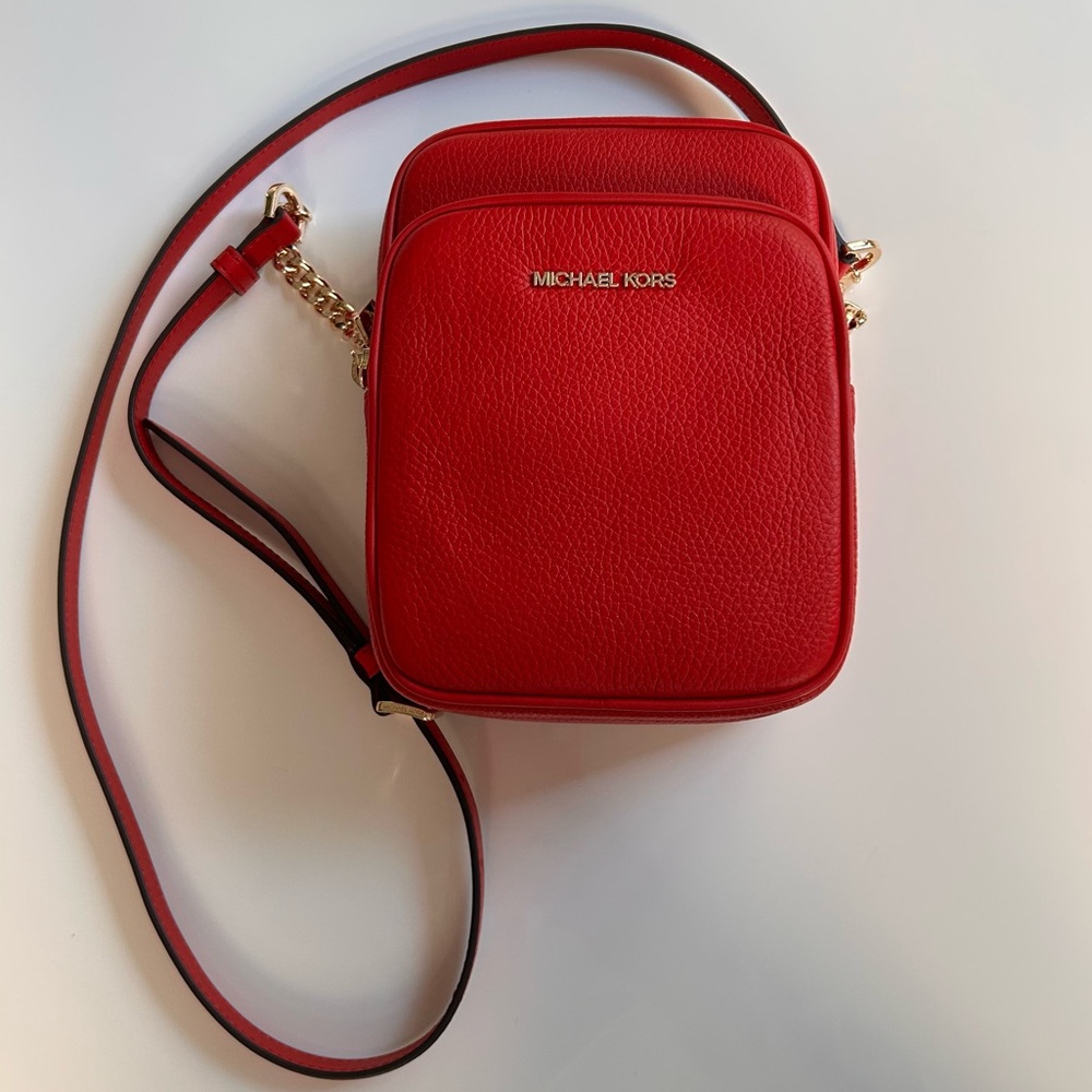 Michael Kors medium red cross body leather travel bag with 2 zipper compartments